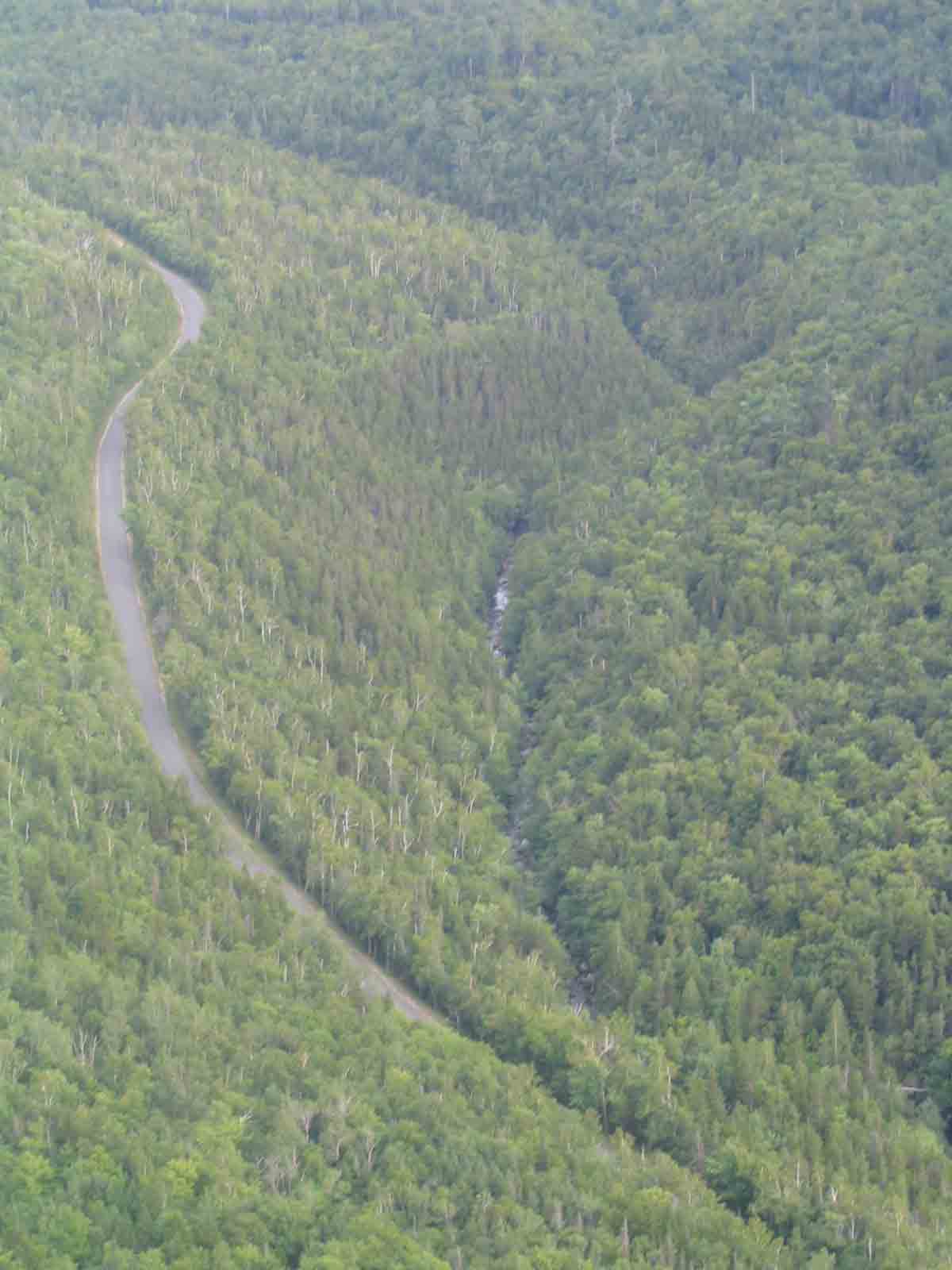 12.7 MM. Here is the view from the overlook 900 feet above Black Brook Notch. Directly below is South Arm Road and paralleling it is Black Brook. Courtesy askus3@optonline.net